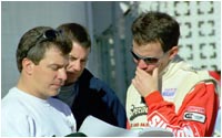 Shane Donley and Kris Wilson check gear ratios with Chris Wakim